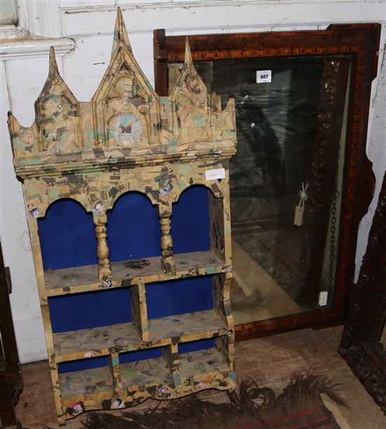 A Victorian inlaid overmantel mirror and paper covered shelves(-)